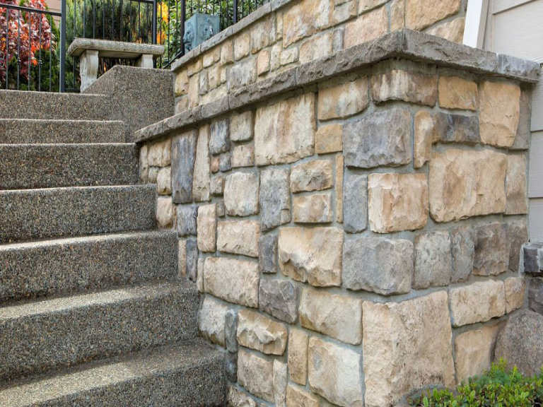 Stone staircase and wall with textured surface